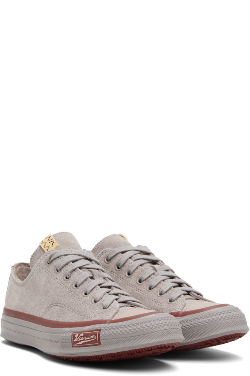 Low-top suede sneakers.

· Rubber cap toe 
· Lace-up closure
· Logo flag at tongue
· Grommets at inner side
· Rubber midsole 
· Rubber logo patch at outer midsole 
· Treaded Vibram® rubber sole

Supplier color: Grey
