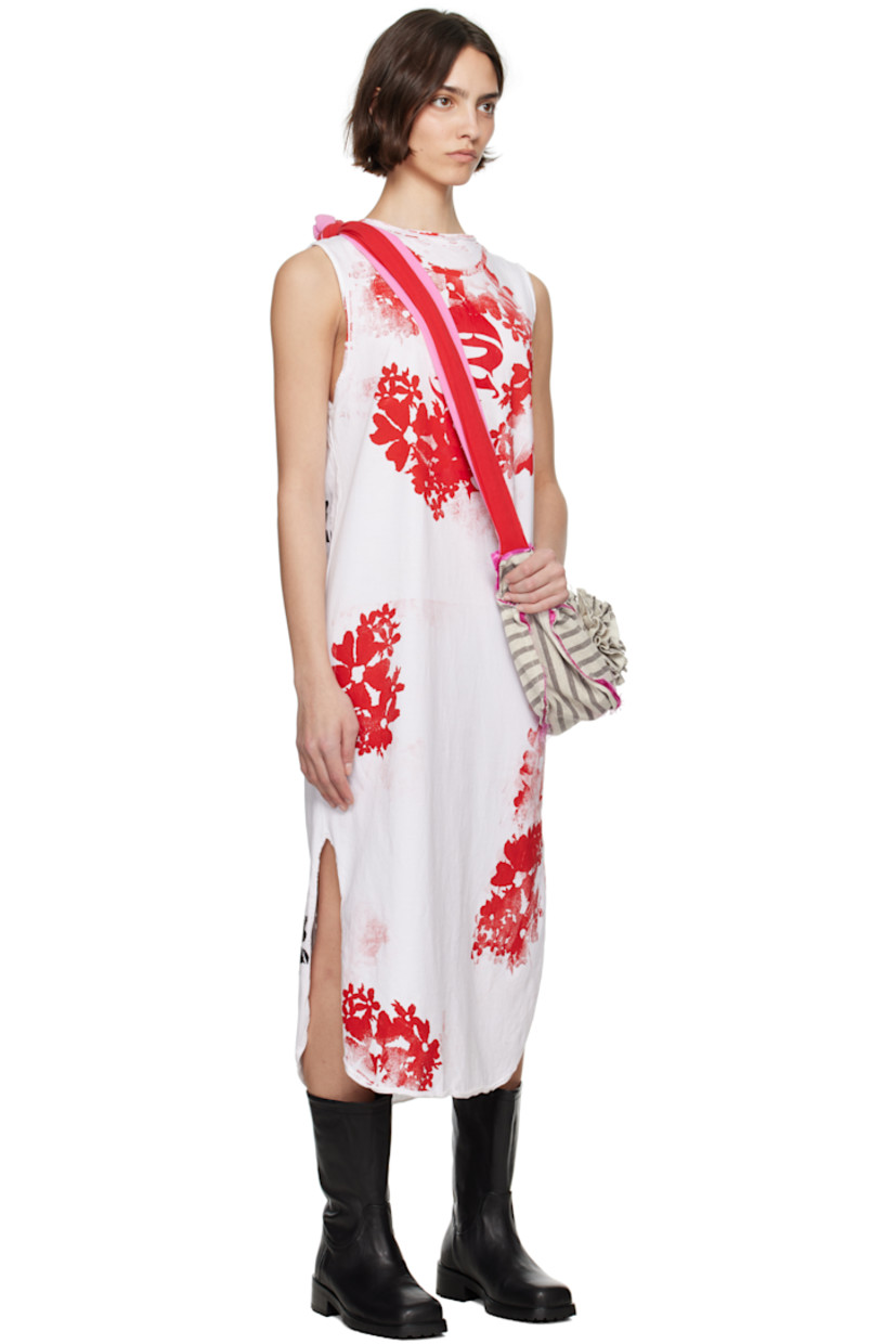 Cotton jersey maxi dress. Graphics printed and rolled edges throughout.

· Round neck
· Vented side seams 

Supplier color: Tribute