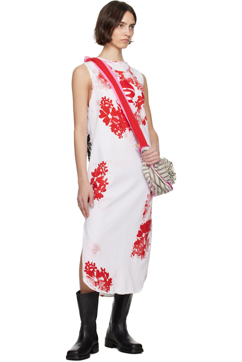 Cotton jersey maxi dress. Graphics printed and rolled edges throughout.

· Round neck
· Vented side seams 

Supplier color: Tribute
