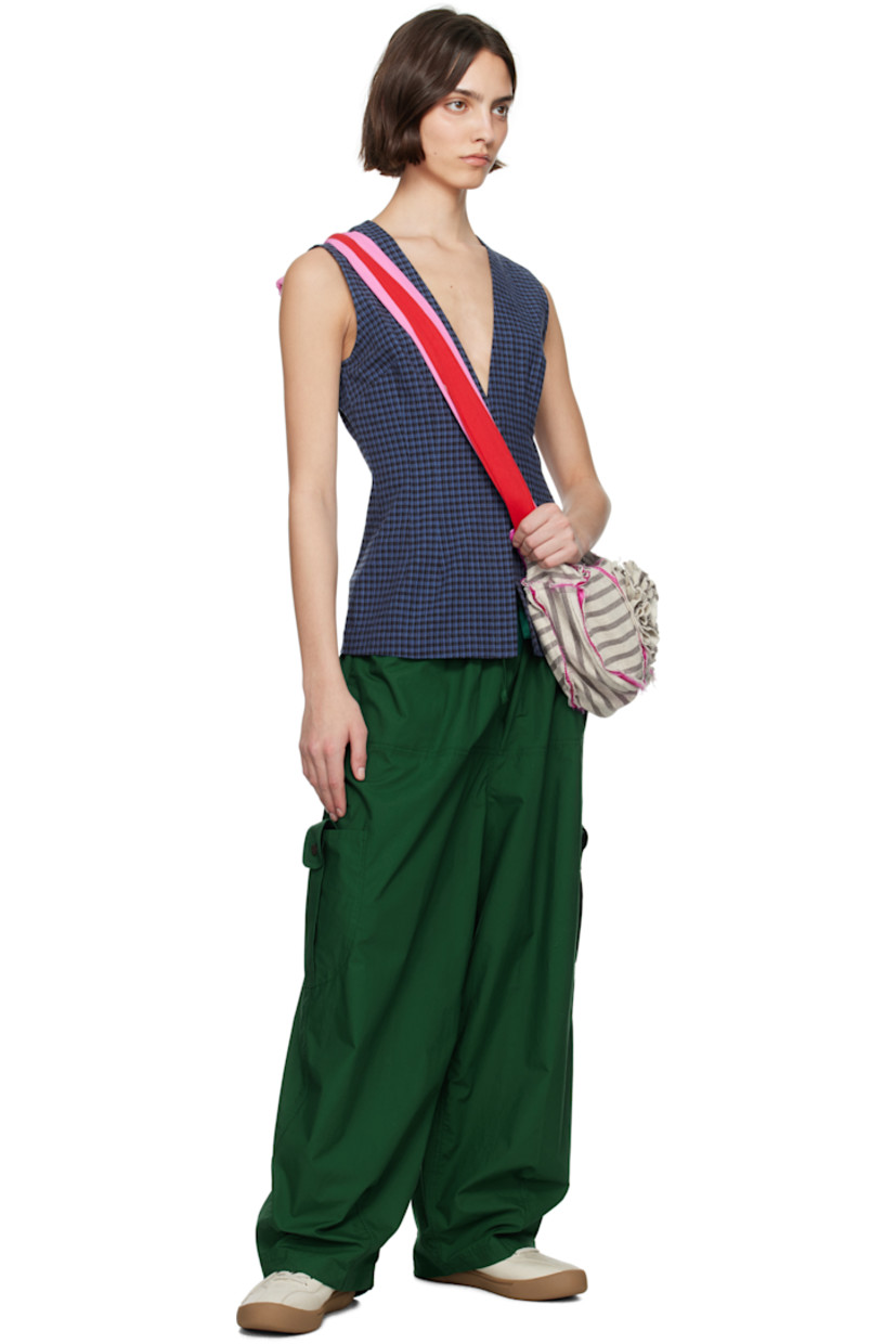 Cotton- and linen-blend hopsack top. Check pattern throughout. 

· Plunging V-neck
· Press-stud closure and darts at front 

Supplier color: Basin