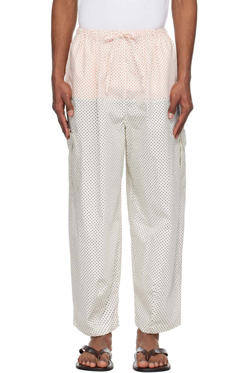 Wide-leg cotton poplin cargo pants. Polka-dot pattern printed throughout.

· Drawstring at elasticized waistband
· Two-pocket styling
· Cargo pocket at outseams

Supplier color: Dot grid
