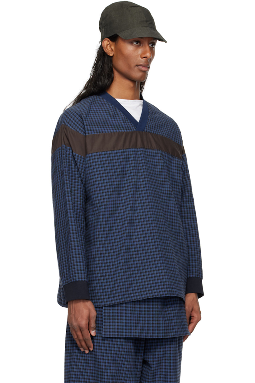 Cotton- and linen-blend flannel and poplin top.

· Paneled construction
· Rib-knit V-neck and cuffs
· Dropped shoulders

Available exclusively at SSENSE.

Supplier color: Basin