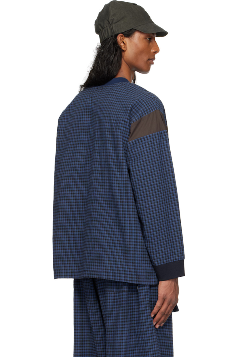 Cotton- and linen-blend flannel and poplin top.

· Paneled construction
· Rib-knit V-neck and cuffs
· Dropped shoulders

Available exclusively at SSENSE.

Supplier color: Basin