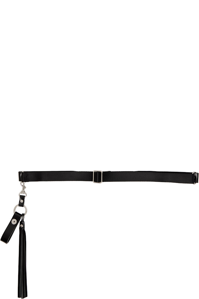Buffed leather belt.

· Studs throughout 
· Keeper loop at front 
· Detachable keychain with clasp and tassel
· Pin-buckle fastening 
· Engraved silver-tone hardware
· W1"

Supplier color: Black