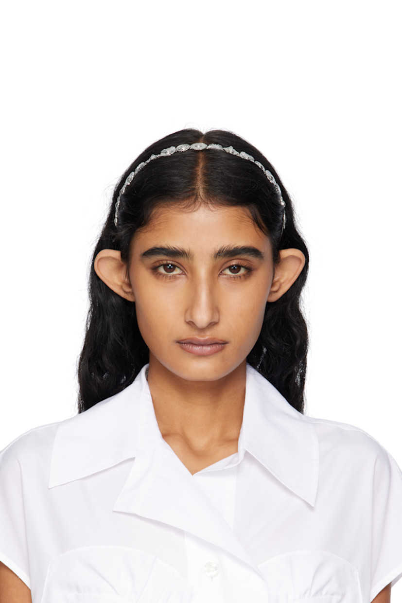 Headband in silver-tone brass.

· Graphic hardware throughout
· D5.5"

Supplier color: Silver