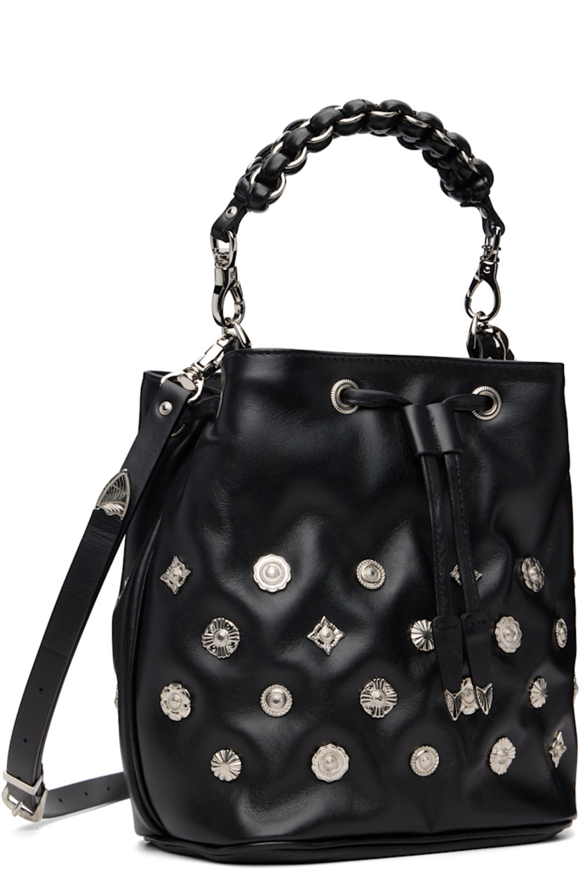 Buffed leather shoulder bag.

· Graphic hardware throughout
· Detachable braided carry handle
· Detachable crossbody strap
· Drawstring closure
· Patch pocket at interior
· Faille lining
· H9" x W9" x D5"

Part of the TOGA TOO collection.

Supplier color: Black