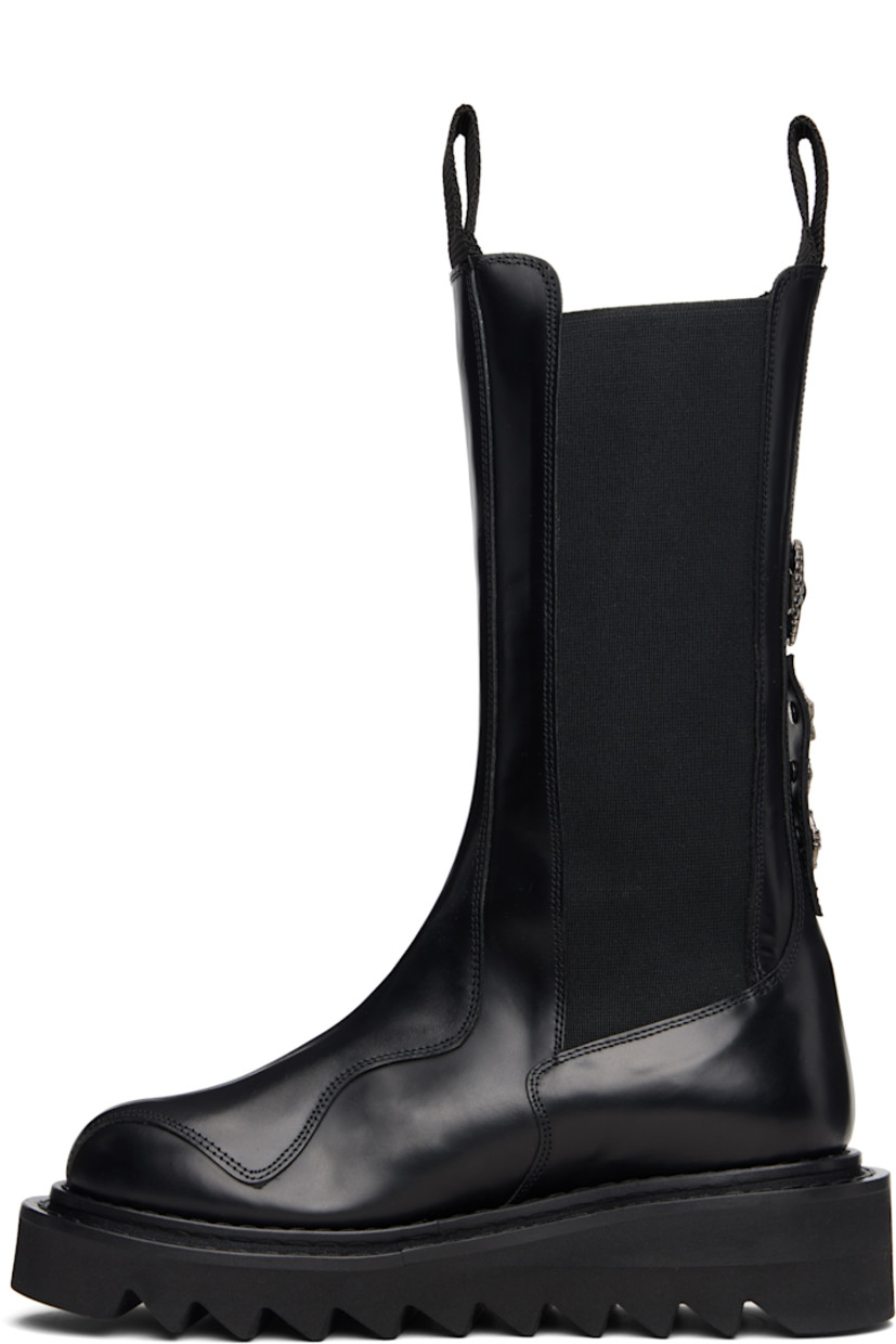 Mid-calf buffed leather Chelsea boots.

· Lace-up closure
· Pull-loops at collar
· Elasticized gusset at sides
· Graphic hardware at heel
· Foam rubber midsole 
· Treaded rubber sole

Available exclusively at SSENSE.

Supplier color: Black