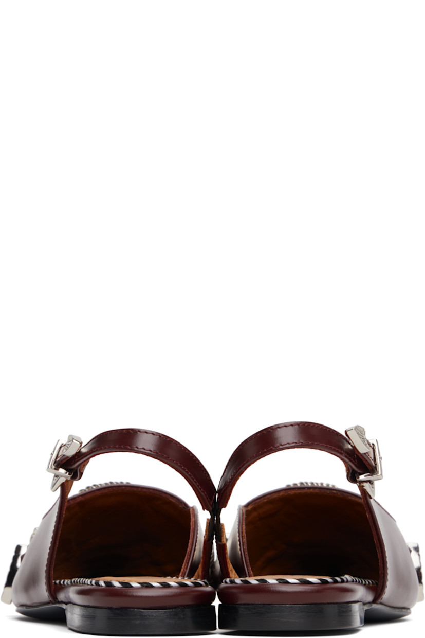 Buffed leather flats.

· Pointed toe
· Straps with graphic hardware at vamp
· Elasticized pin-buckle slingback strap
· Rubber heel
· Leather sole

Supplier color: Bordeaux