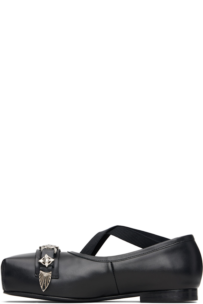 Buffed leather ballerina flats.

· Square toe
· Strap with graphic hardware at vamp
· Crisscrossing elasticized straps at vamp
· Stacked leather heel with rubber injection
· Leather sole

Supplier color: Black
