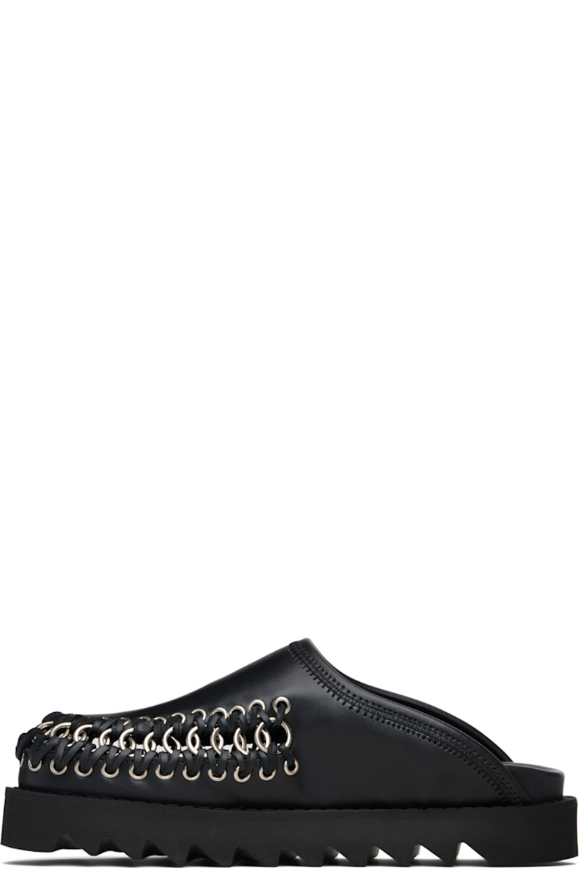 Buffed leather slip-on loafers.

· O-rings, grommets, and overlock stitching at vamp
· Logo stamp at molded footbed
· Treaded rubber sole 
· Platform: H1.5"

Supplier color: Black