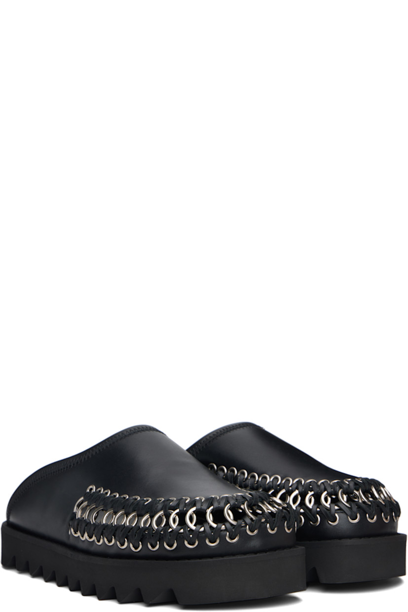 Buffed leather slip-on loafers.

· O-rings, grommets, and overlock stitching at vamp
· Logo stamp at molded footbed
· Treaded rubber sole 
· Platform: H1.5"

Supplier color: Black