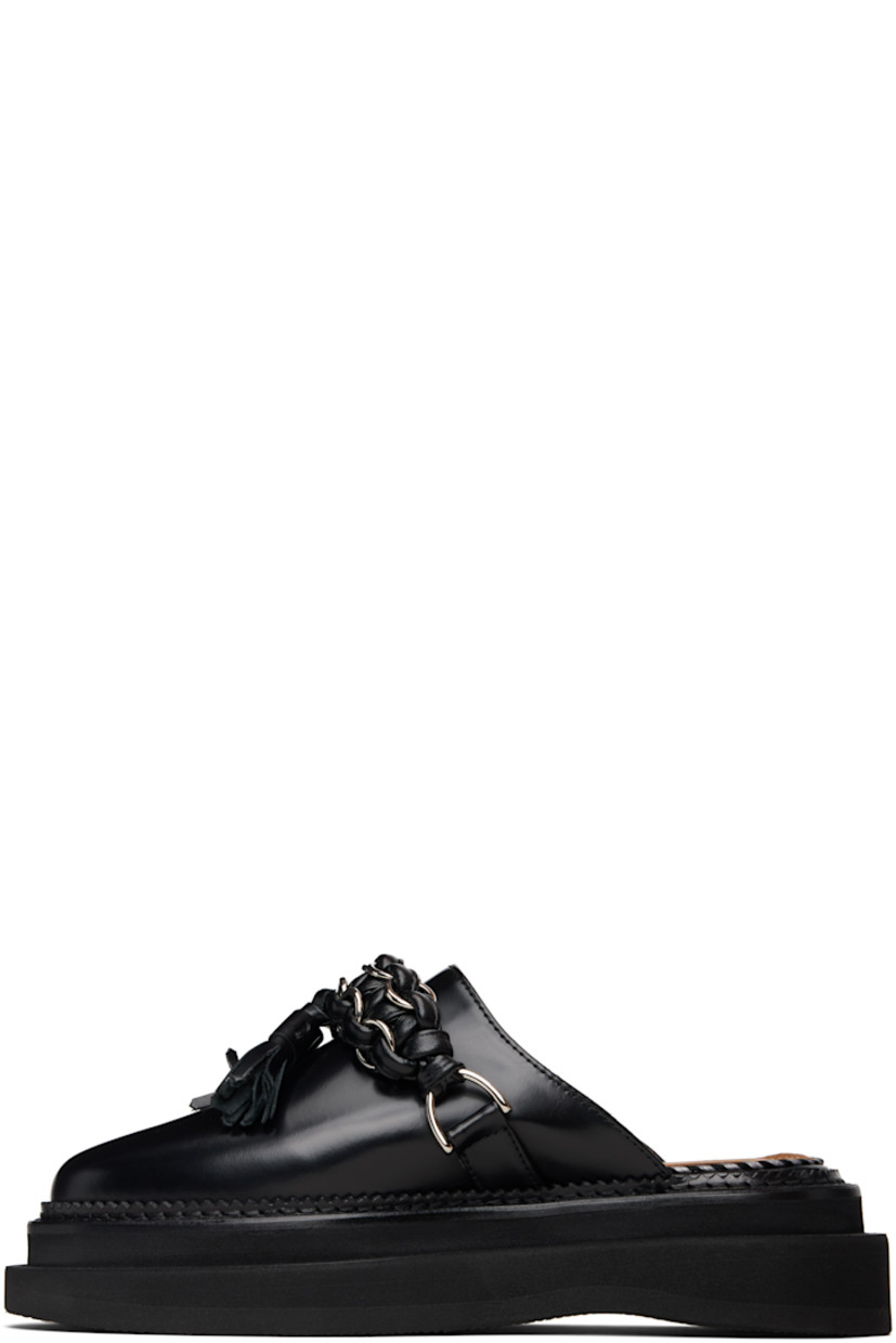 Buffed leather slip-on loafers.

· Braided strap with O-rings and tassels at vamp
· Serrated edge and topstitching at welt
· Foam rubber midsole
· Treaded rubber sole

Supplier color: Black