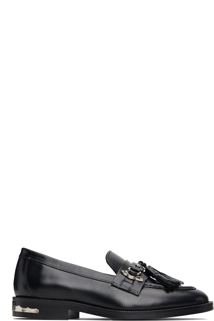 Polished leather loafers.

· Moc toe
· Tassels and strap with graphic hardware at vamp
· Serrated detailing at welt
· Plaque at heel
· Stacked leather heel with rubber injection
· Leather sole

Supplier color: Black