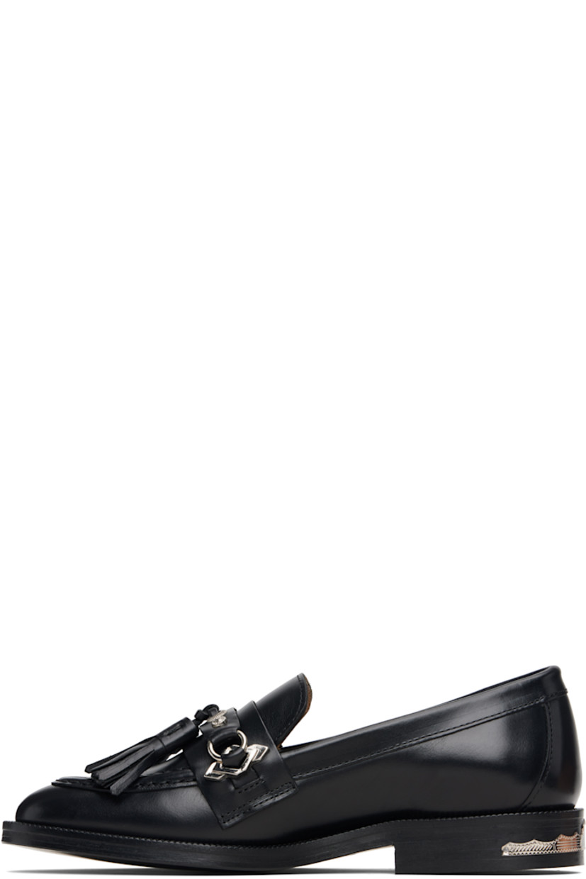 Polished leather loafers.

· Moc toe
· Tassels and strap with graphic hardware at vamp
· Serrated detailing at welt
· Plaque at heel
· Stacked leather heel with rubber injection
· Leather sole

Supplier color: Black