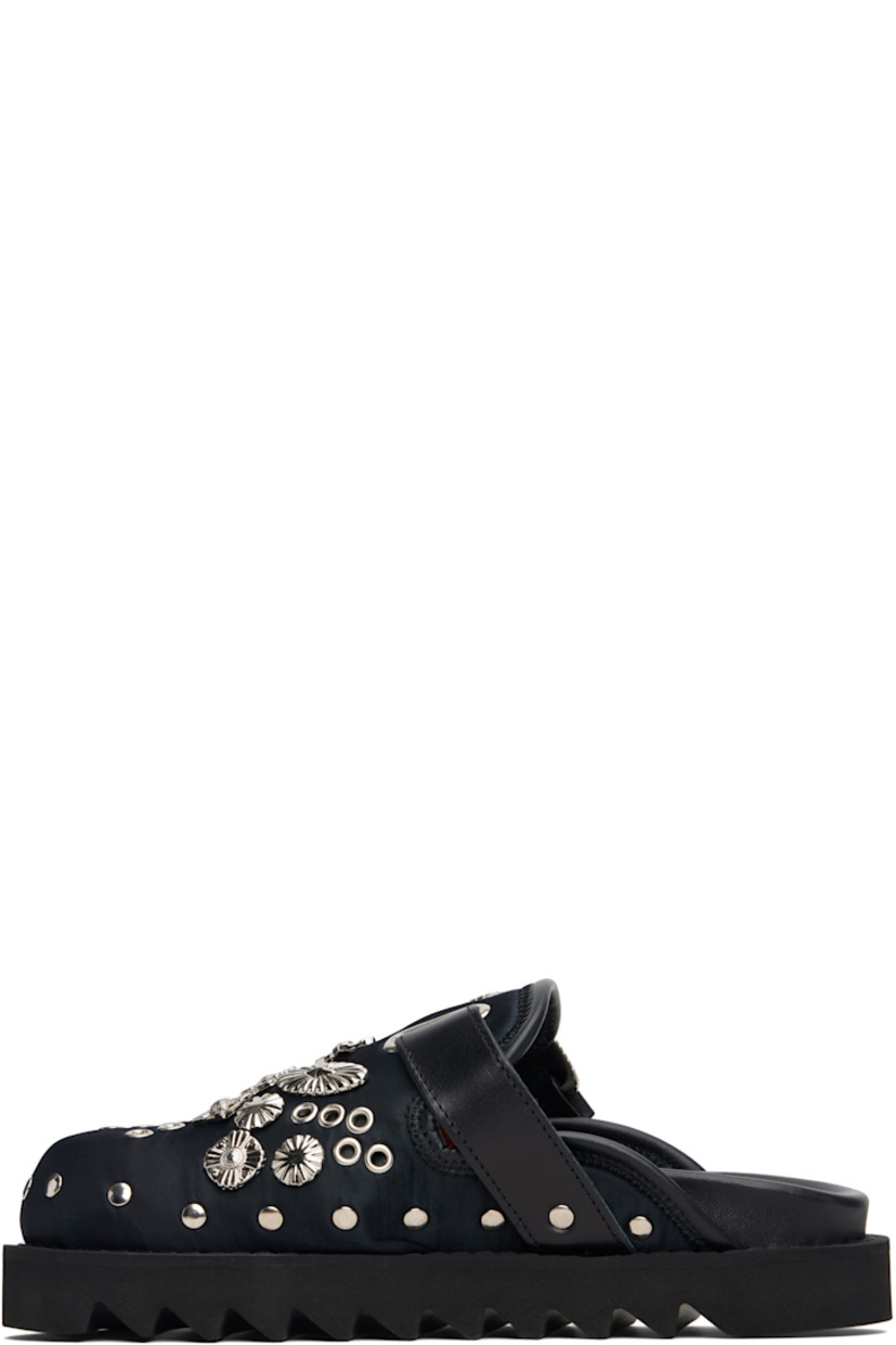 Taffeta slip-on loafers.

· Rivets throughout
· Graphic hardware and metal eyelets at vamp
· Pin-buckle strap at vamp
· Mesh lining
· Foam rubber midsole
· Treaded rubber sole

Supplier color: Black