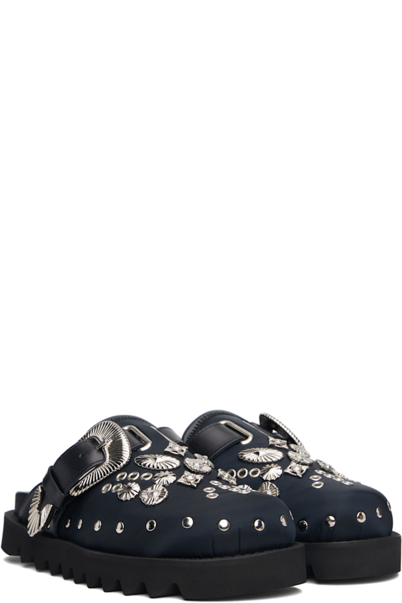 Taffeta slip-on loafers.

· Rivets throughout
· Graphic hardware and metal eyelets at vamp
· Pin-buckle strap at vamp
· Mesh lining
· Foam rubber midsole
· Treaded rubber sole

Supplier color: Black
