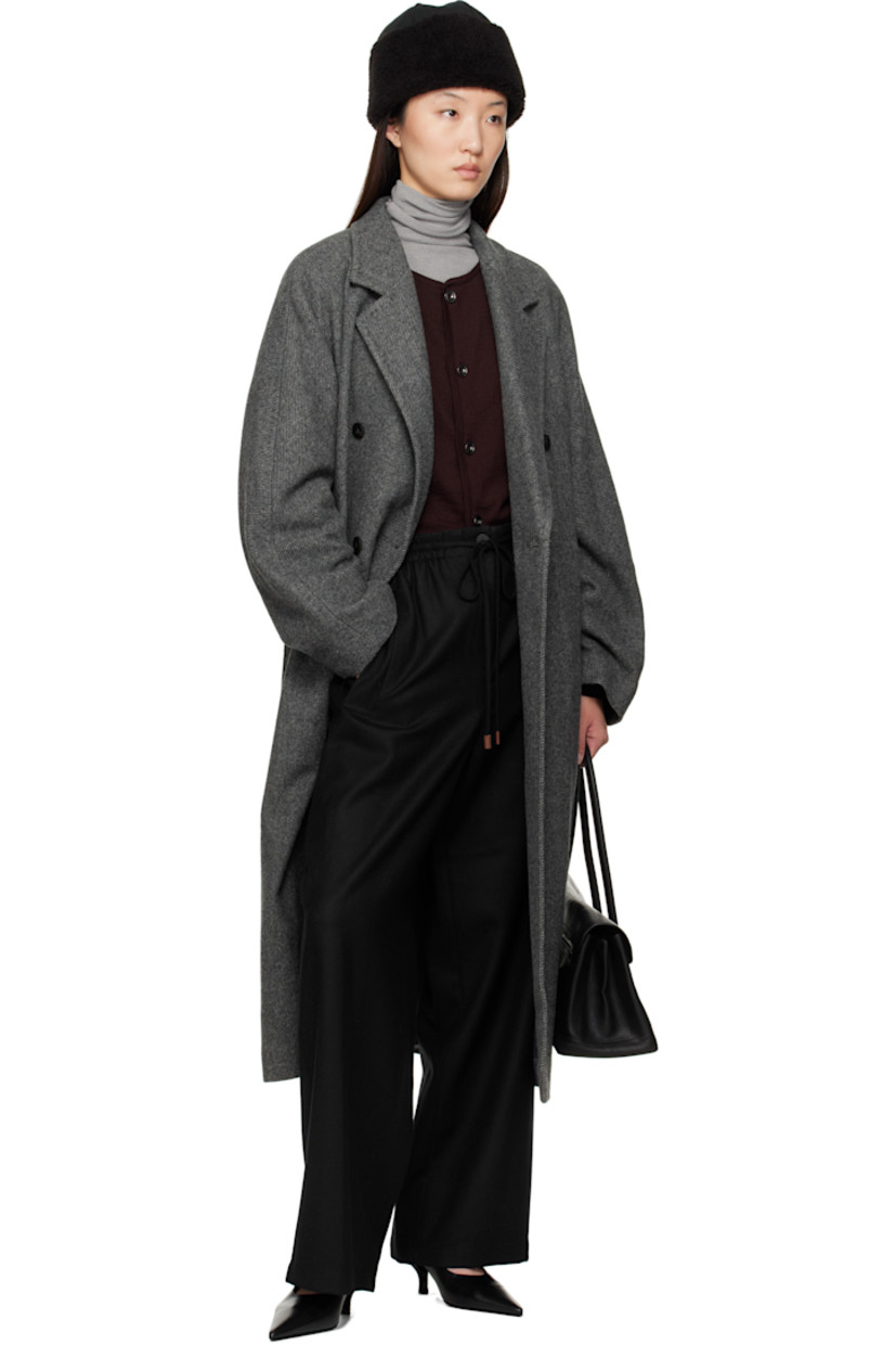 Wool twill trousers.

· Drawstring at elasticized waistband
· Four-pocket styling
· Zip fly

Supplier color: Navy