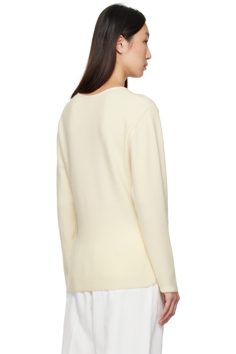 Knit wool- and nylon-blend cardigan. 

· Round neck
· Button closure

Supplier color: Ivory
