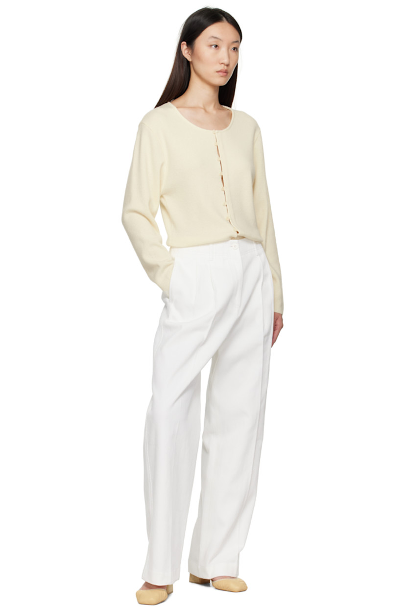 Knit wool- and nylon-blend cardigan. 

· Round neck
· Button closure

Supplier color: Ivory