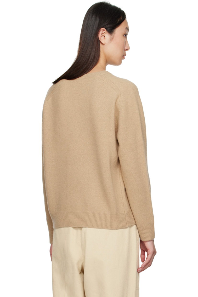 Knit wool- and nylon-blend sweater. 

· Rib-knit crewneck, hem, and cuffs
· Raglan sleeves

Supplier color: Camel