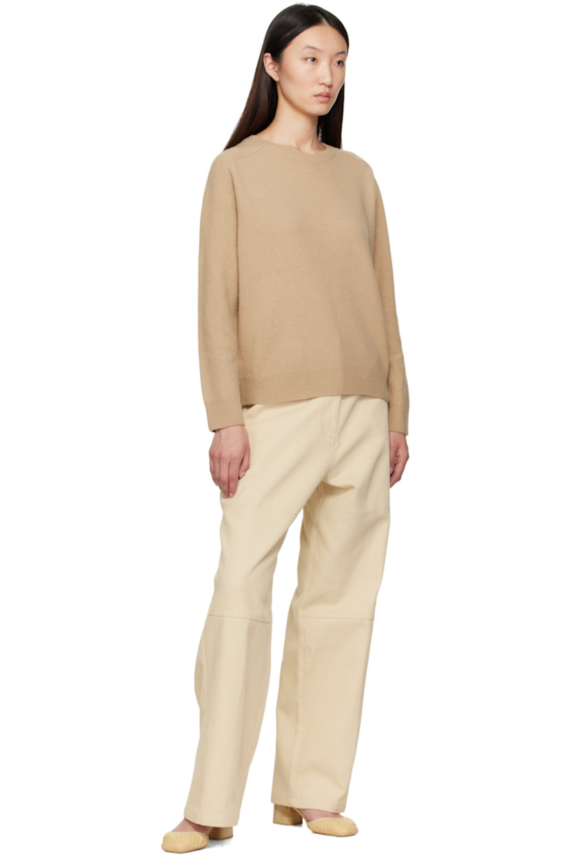 Knit wool- and nylon-blend sweater. 

· Rib-knit crewneck, hem, and cuffs
· Raglan sleeves

Supplier color: Camel