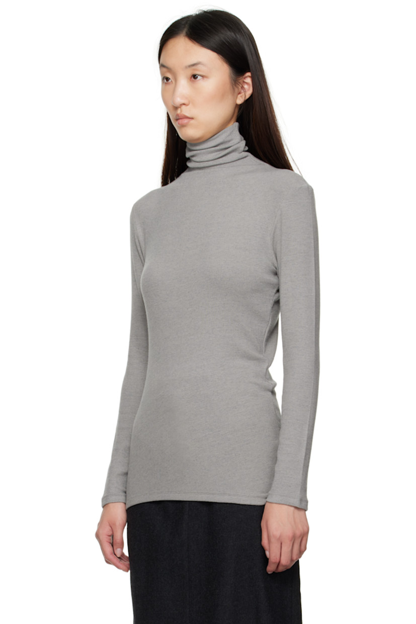 Stretch viscose- and wool-blend ribbed jersey turtleneck. Asymmetric hem.

Supplier color: Gray
