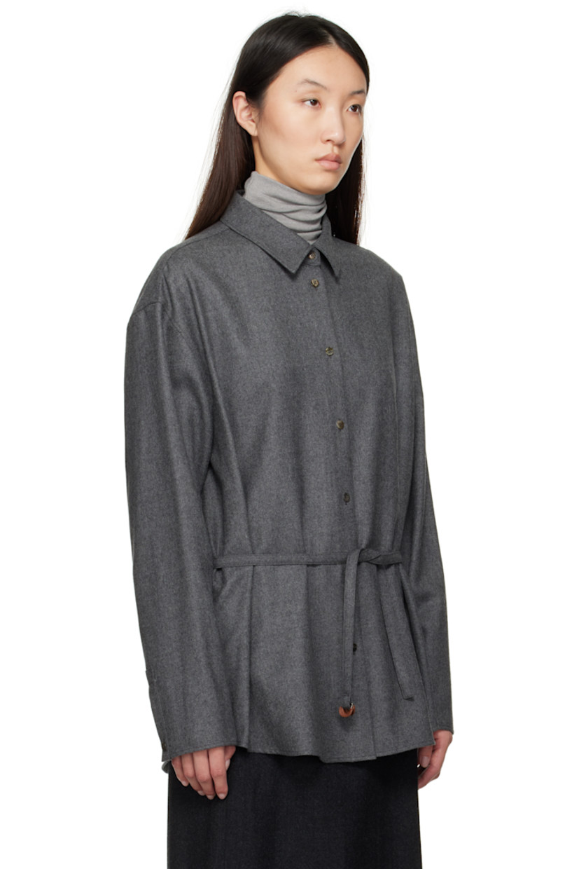 Brushed wool twill shirt. 

· Spread collar
· Button closure
· Belt loops and detachable self-tie belt
· Shirttail hem 
· Dropped shoulders
· Button fastening at cuffs

Supplier color: Gray