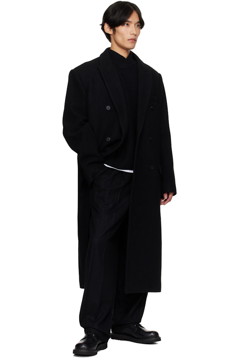 Wool- and cashmere-blend melton coat. 

· Peaked lapel
· Double-breasted button closure
· Welt pocket at chest
· Flap pockets at waist
· Buttoned surgeon's cuffs
· Logo hardware at back collar 
�· Central vent at back hem 
· Welt pockets at interior 
· Full satin twill lining 

Supplier color: Black