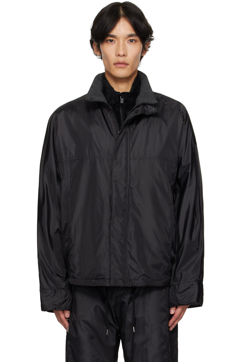 Ripstop jacket. 

· Stand collar 
· Concealed zip closure and press-stud placket
· Welt pockets at waist
· Dropped shoulders
· Welt pocket at interior 
· Full fleece lining 

Supplier color: Black