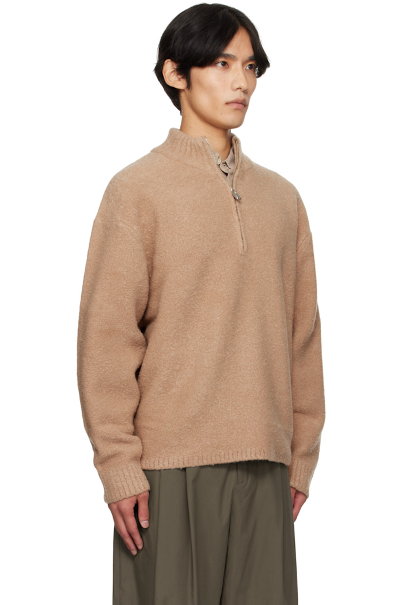 Bouclé-knit stretch wool-blend sweater.

· Rib-knit stand collar, hem, and cuffs
· Half-zip closure
· Dropped shoulders

Supplier color: Camel