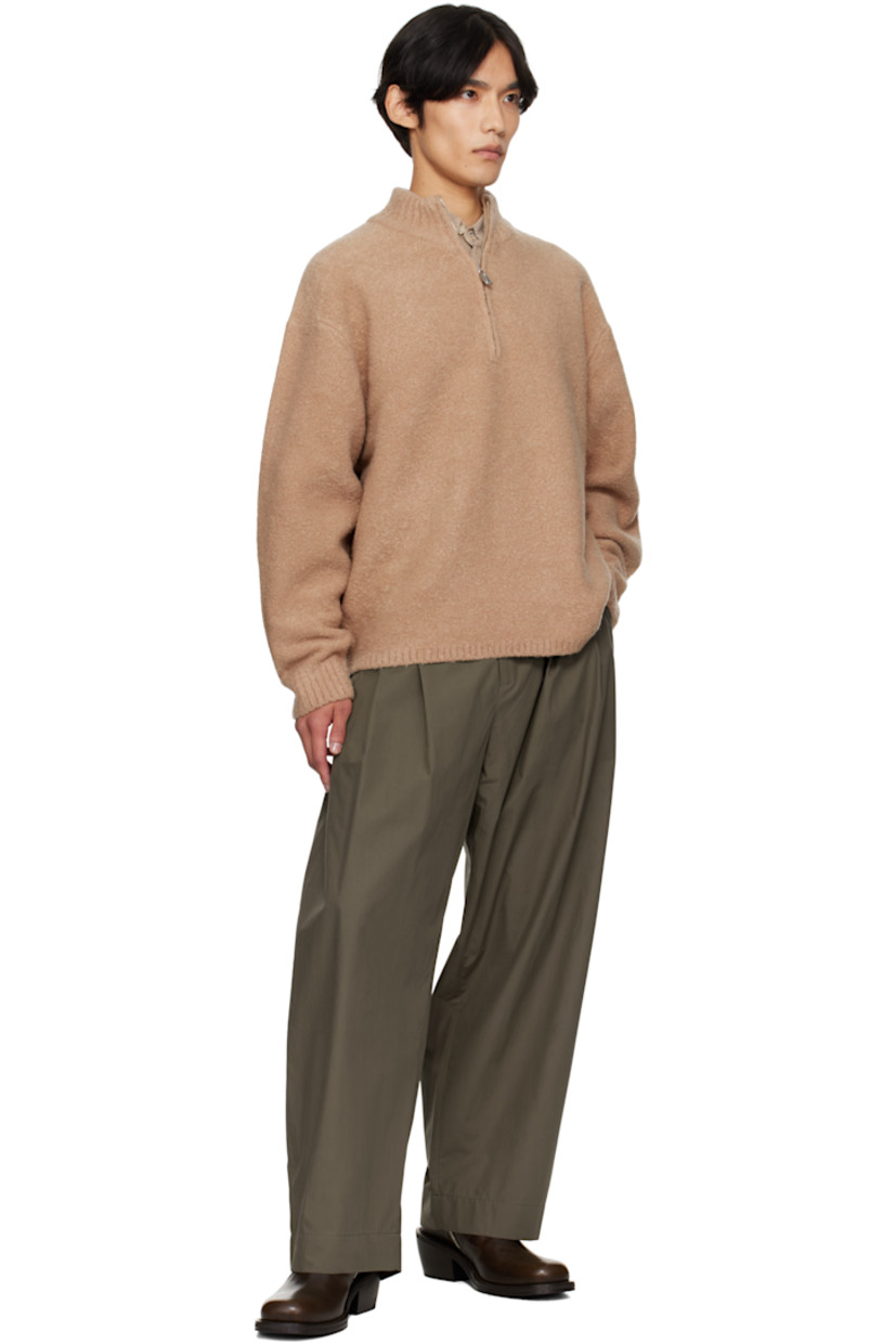 Bouclé-knit stretch wool-blend sweater.

· Rib-knit stand collar, hem, and cuffs
· Half-zip closure
· Dropped shoulders

Supplier color: Camel