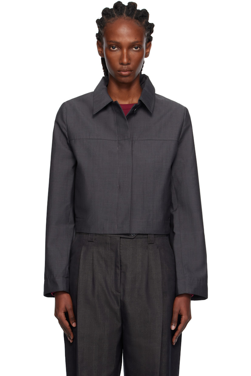 Deadstock wool delaine jacket.

· Check pattern throughout
· Spread collar
· Button closure
· Seam pockets
· Cropped hem
· Full satin lining

Supplier color: Grey micro check