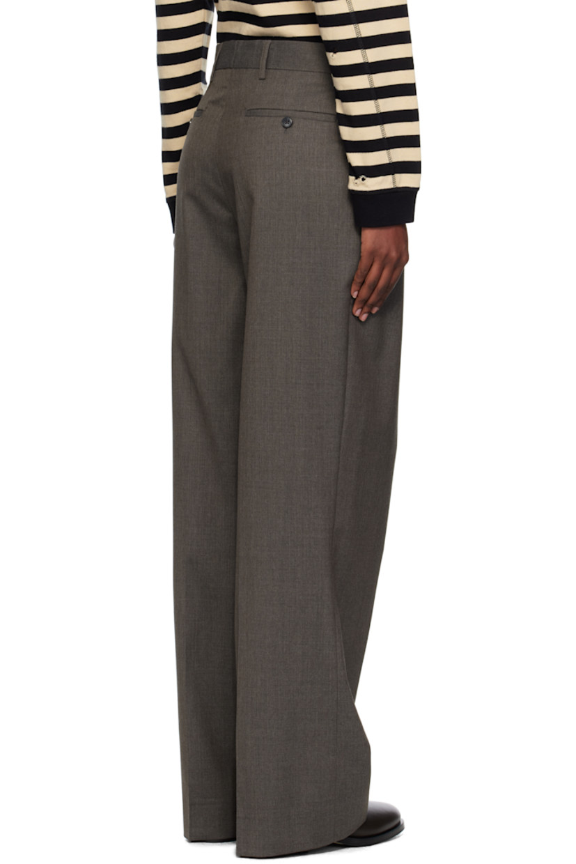 Wool delaine trousers.

· Straight-leg
· Belt loops
· Four-pocket styling
· Zip fly
· Pleats at front
· Partial satin lining

Supplier color: Taupe wool