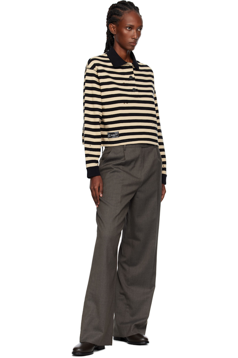 Wool delaine trousers.

· Straight-leg
· Belt loops
· Four-pocket styling
· Zip fly
· Pleats at front
· Partial satin lining

Supplier color: Taupe wool