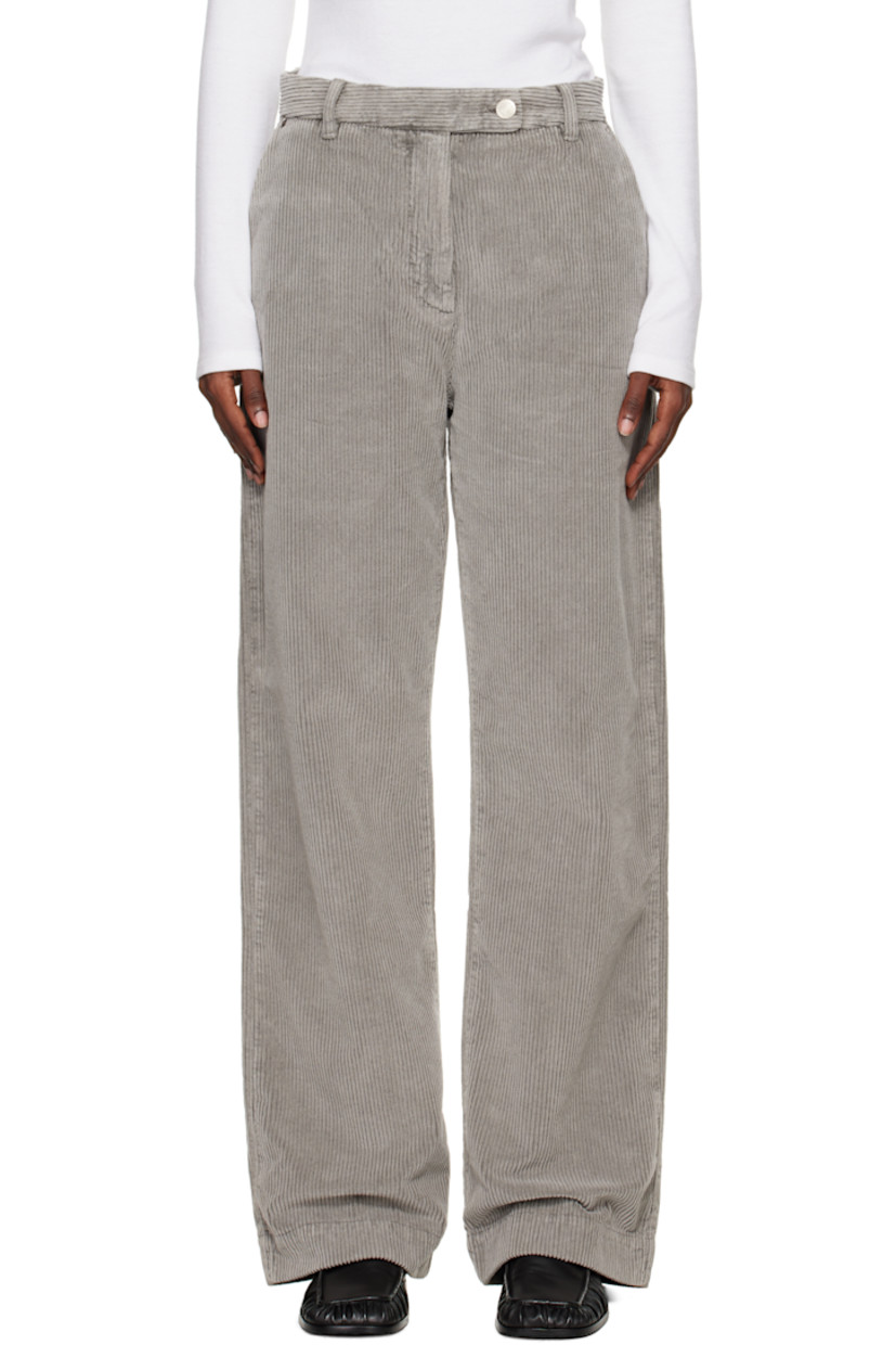 Recycled cotton-blend corduroy trousers.

· Smudging throughout
· Mid-rise
· Belt loops
· Three-pocket styling
· Zip fly

Available exclusively at SSENSE.

Supplier color: Stained grey