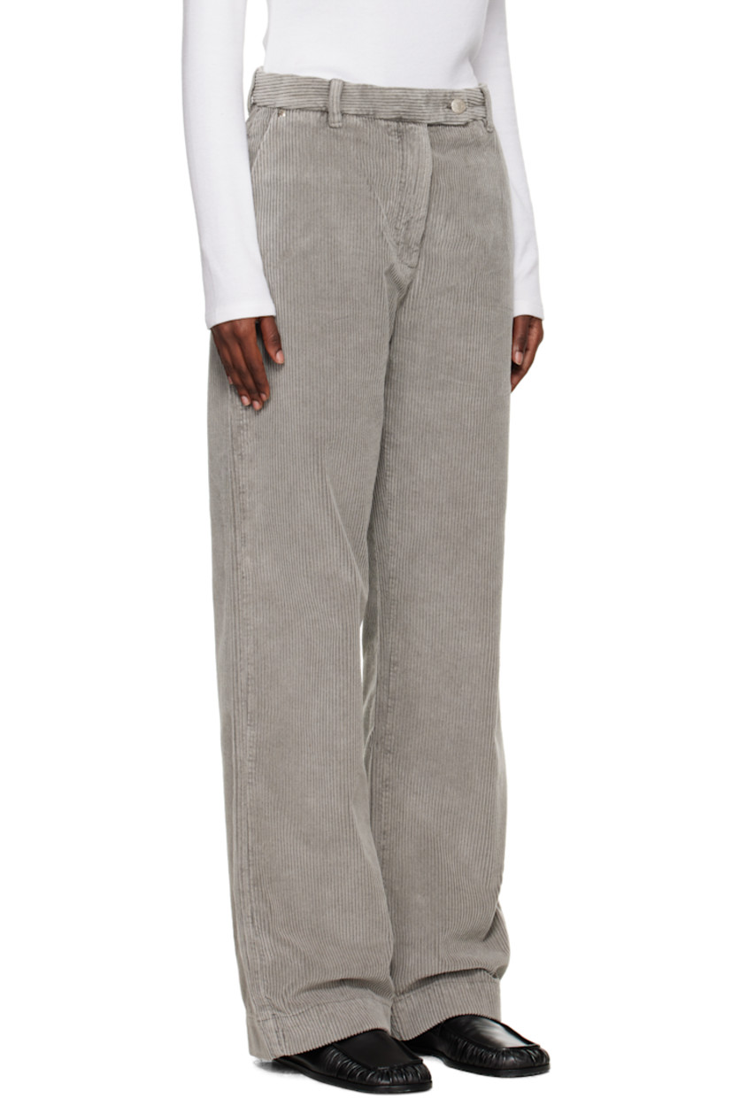 Recycled cotton-blend corduroy trousers.

· Smudging throughout
· Mid-rise
· Belt loops
· Three-pocket styling
· Zip fly

Available exclusively at SSENSE.

Supplier color: Stained grey