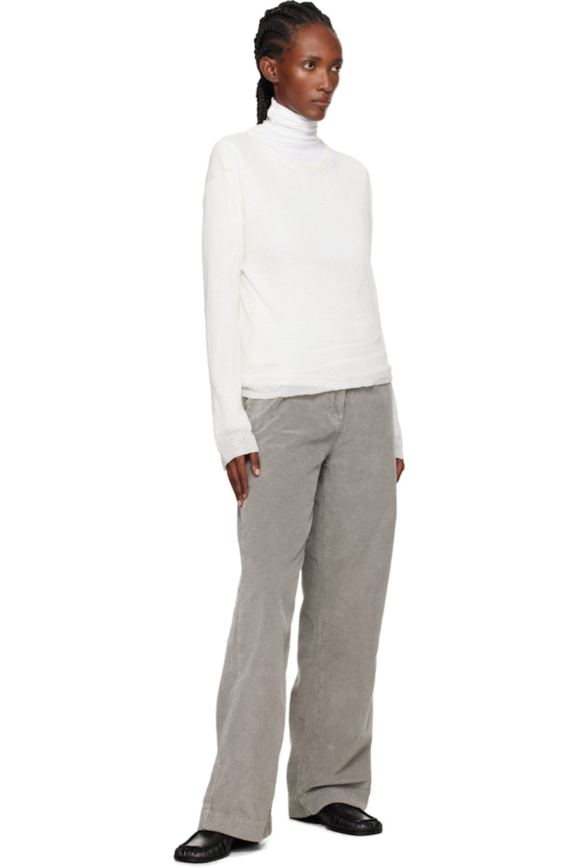 Recycled cotton-blend corduroy trousers.

· Smudging throughout
· Mid-rise
· Belt loops
· Three-pocket styling
· Zip fly

Available exclusively at SSENSE.

Supplier color: Stained grey