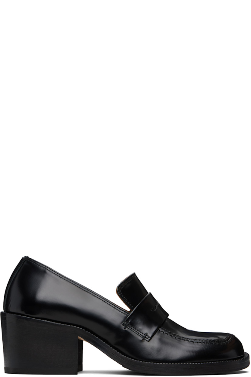 Polished leather loafers. 

· Square moc toe 
· Strap with cutout at vamp
· Stacked leather block heel 
· Leather sole with rubber injections 
· Heel: H2.5"

Supplier color: Black polido