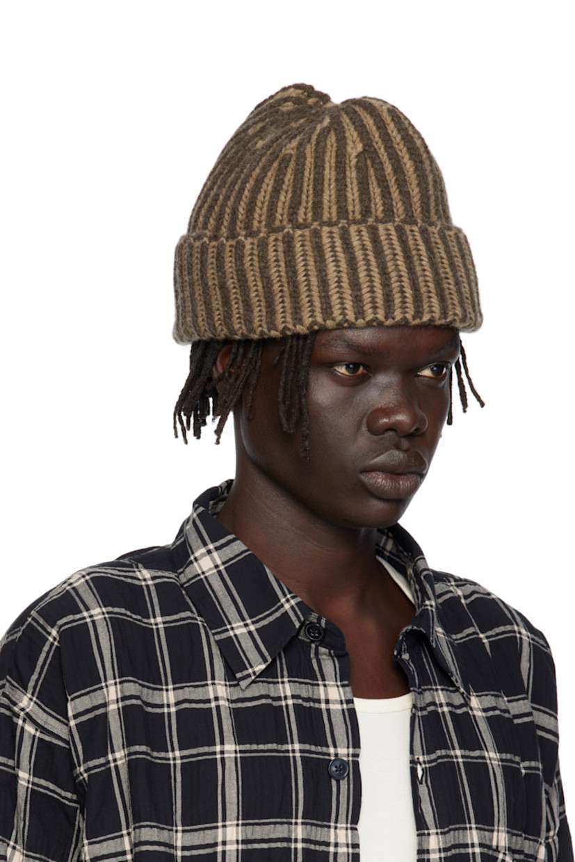 Knit wool beanie.

· Knit stripes throughout
· Rolled brim

Supplier color: Biscuit