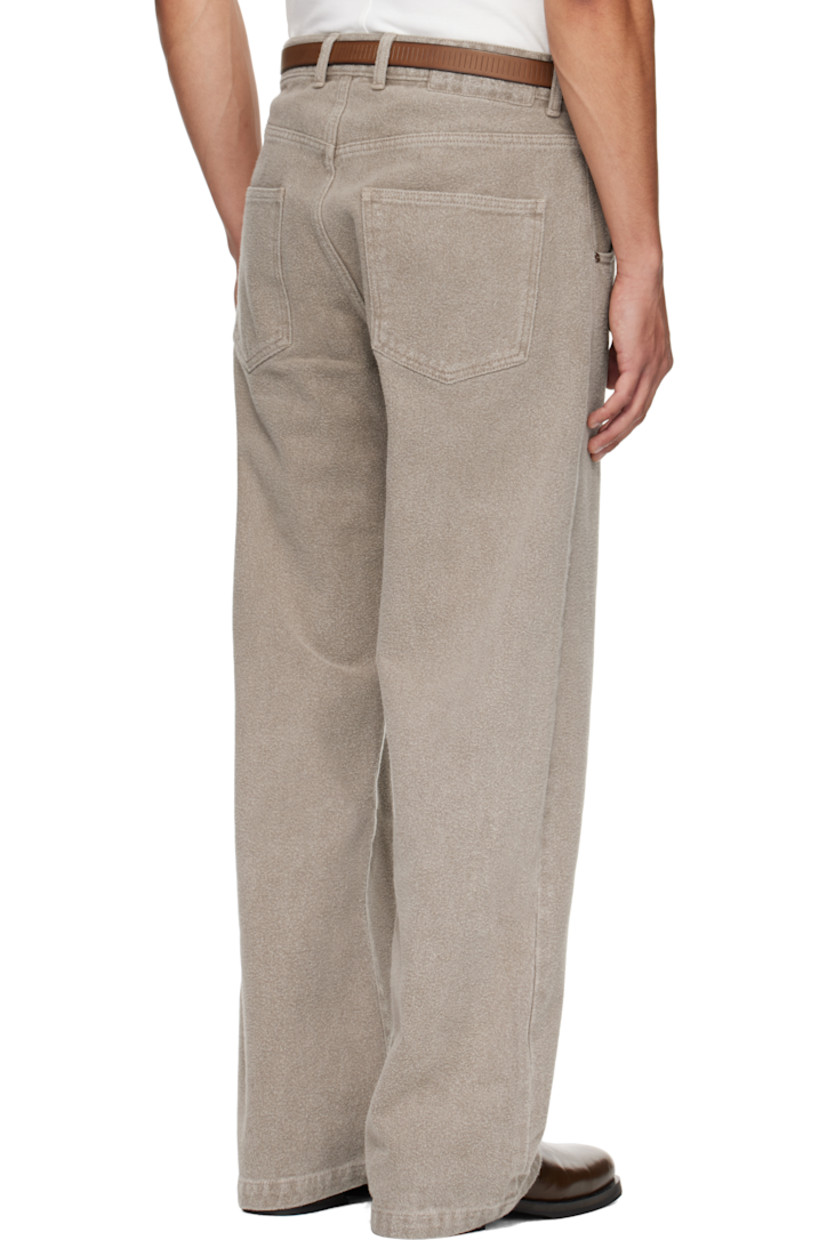 Brushed non-stretch organic cotton denim jeans.

· Garment-washed and pre-shrunk
· Loose-fit and straight-leg 
· Mid-rise
· Fading throughout
· Belt loops
· Four-pocket styling
· Zip fly

Supplier color: Brushed mudstone