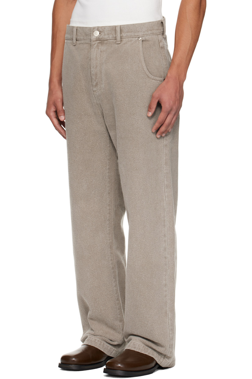 Brushed non-stretch organic cotton denim jeans.

· Garment-washed and pre-shrunk
· Loose-fit and straight-leg 
· Mid-rise
· Fading throughout
· Belt loops
· Four-pocket styling
· Zip fly

Supplier color: Brushed mudstone