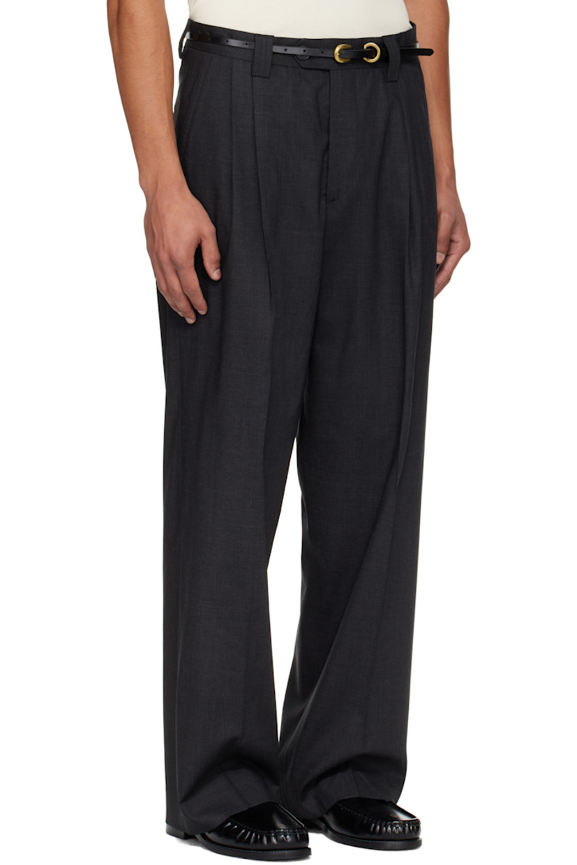 Deadstock wool delaine trousers.

· Wide straight-leg
· Mid-rise
· Belt loops
· Four-pocket styling
· Zip fly
· Pleats at front
· Creased legs
· Partial satin lining

Supplier color: Dark grey wool