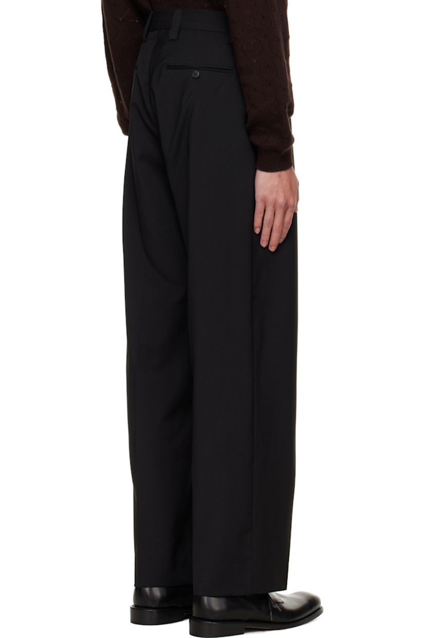 Wool delaine trousers.

· Straight-leg 
· Mid-rise
· Belt loops
· Four-pocket styling
· Zip fly
· Creased legs

Supplier color: Black wool