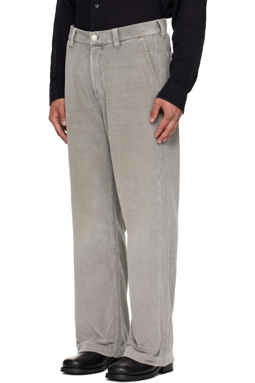 Cotton corduroy trousers.

· Garment-washed and pre-shrunk
· Smudging throughout
· Loose-fit and straight-leg
· Mid-rise
· Belt loops
· Four-pocket styling
· Zip fly

Supplier color: Stained grey