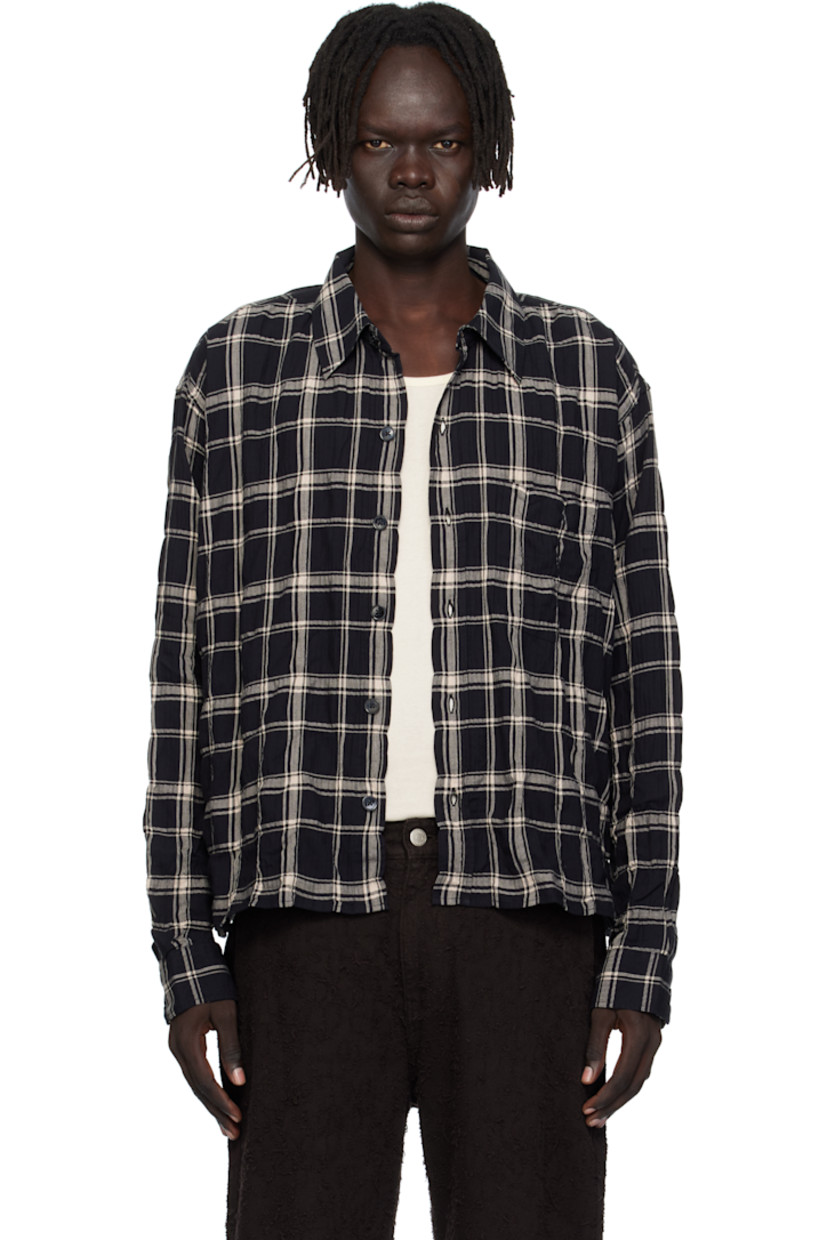 Crinkled stretch cotton herringbone shirt.

· Check pattern throughout
· Spread collar
· Button closure
· Patch pocket at chest
· Adjustable buttoned barrel cuffs
· Box pleat at back yoke

Available exclusively at SSENSE.

Supplier color: Carpenter check