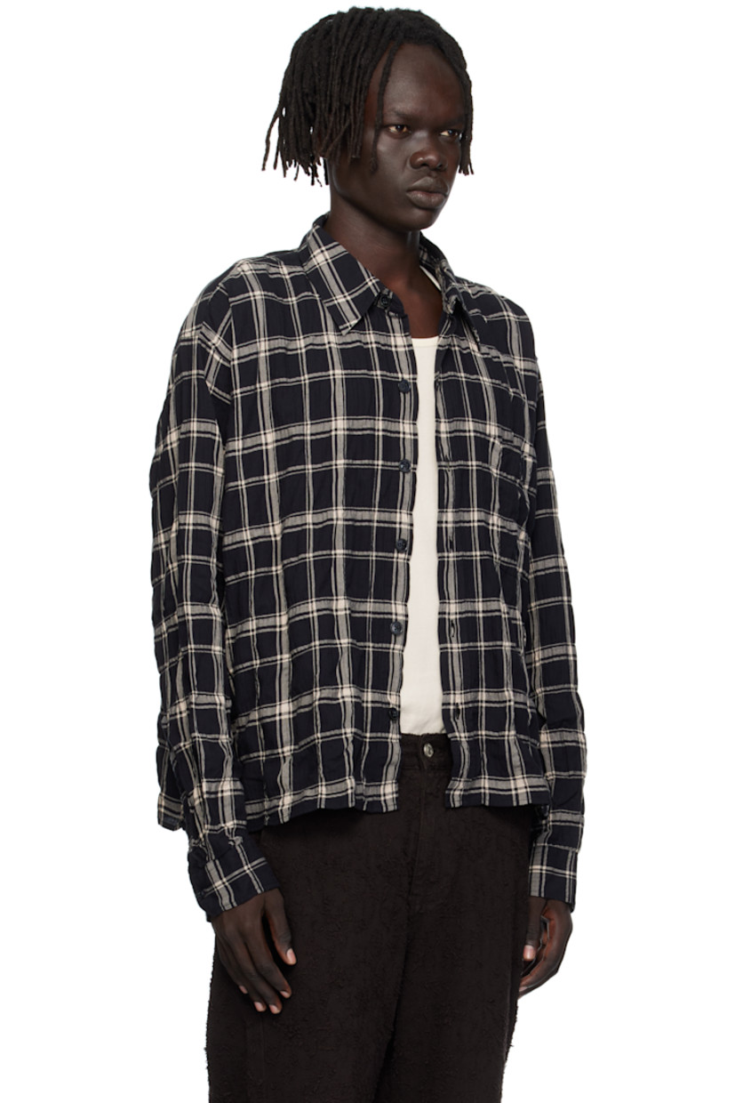 Crinkled stretch cotton herringbone shirt.

· Check pattern throughout
· Spread collar
· Button closure
· Patch pocket at chest
· Adjustable buttoned barrel cuffs
· Box pleat at back yoke

Available exclusively at SSENSE.

Supplier color: Carpenter check