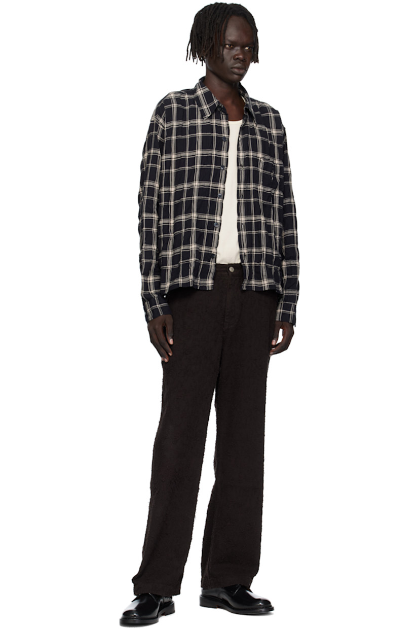 Crinkled stretch cotton herringbone shirt.

· Check pattern throughout
· Spread collar
· Button closure
· Patch pocket at chest
· Adjustable buttoned barrel cuffs
· Box pleat at back yoke

Available exclusively at SSENSE.

Supplier color: Carpenter check