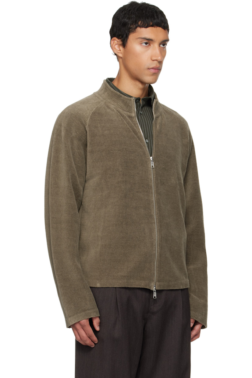 Cotton corduroy jacket. 

· Stand collar 
· Two-way zip closure 
· Exposed seam at raglan sleeves 

Supplier color: Faded taupe jersey corduroy