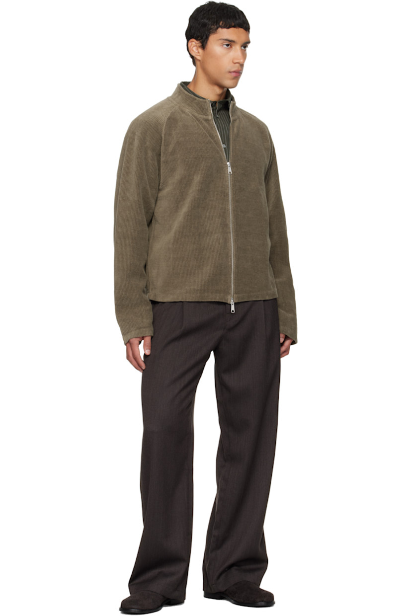 Cotton corduroy jacket. 

· Stand collar 
· Two-way zip closure 
· Exposed seam at raglan sleeves 

Supplier color: Faded taupe jersey corduroy