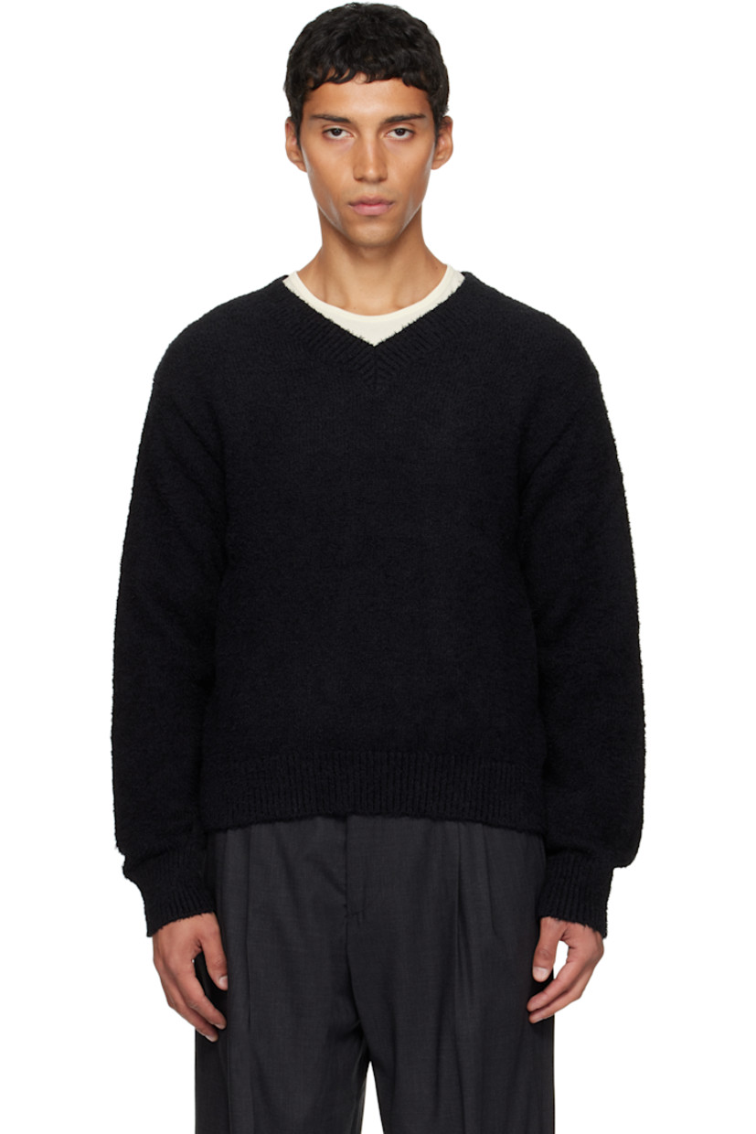 Brushed knit organic cotton sweater. Rib-knit V-neck, hem, and cuffs.

Supplier color: Furry black